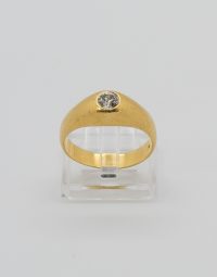 Lot 46 - Bague jonc en or ornée d'un diamant