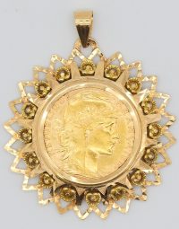 Lot 06 - Pendentif en or orné d'une pièce de 20 Francs