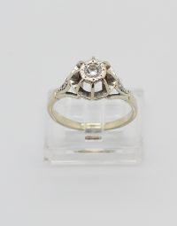 Lot 21 - Bague en or et platine ornée d'un diamant