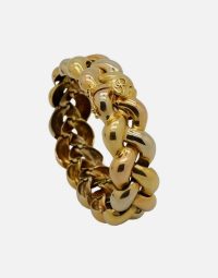 Lot 42 - POIRAY. Bracelet trois ors