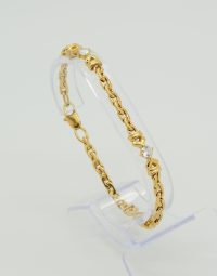 Lot 48 - Bracelet en or orné de pierres