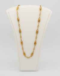 Lot 57 - Chaine giletière en or