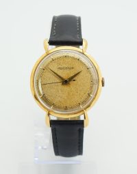 Lot 44 - JAEGER-LECOULTRE. Montre en or