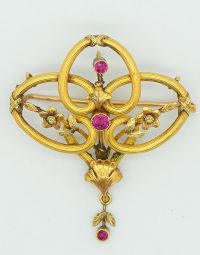 Lot 58 - Broche en or ornée de pierres
