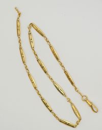 Lot 70 - Chaine giletière en or
