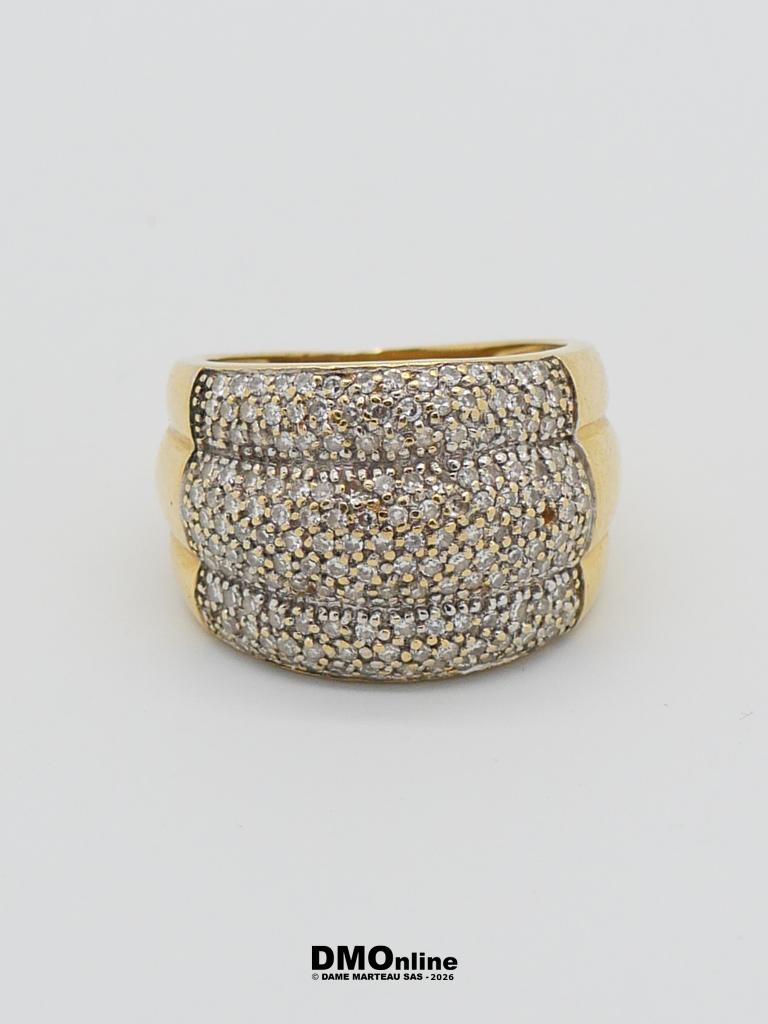Gold ring with wide pavé-diamond setting, two-tone finish, centered on a plain light background.