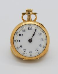 Gold pocket watch with white dial and black numerals, showing about 12:10 on a white background.